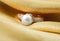 Elegant jewelry ring with pearl and brilliants