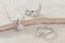 Elegant jewelry set of white gold ring, necklace and earrings with diamonds