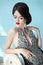 Elegant lady. Makeup. Hairstyle. Jewelry. Brunette sensual woman