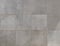 Elegant large gray square stone tiles.