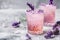 Elegant Lavender Cocktail in Crystal Glass with Floral Accents