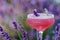 Elegant Lavender Cocktail in Crystal Glass with Floral Accents