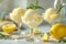Elegant lemon sorbet in stemware with fresh lemons and mint, perfect for summer refreshment