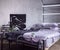 Elegant lilac house bedroom interior with bed, big picture, table and lights
