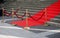 Elegant long red carpet on the wide steps of historic building