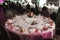 Elegant luxury cutlery and tablewear with flowers at hotel wedding reception