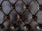 Elegant luxury dark brown leather with buttons. Leather pattern texture background
