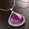 An elegant magenta and silver necklace with a dangling pendant. Trendy color of 2023 Viva Magenta.. AI generation