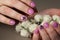 Elegant manicure design lilac with a pattern