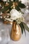 Elegant mini bouquet from white rose, protea and gypsophila