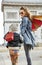 Elegant mother and daughter shopper in Paris, France walking