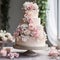 Elegant Multi-tiered Wedding Cake with Intricate Details and Luxurious Embellishments