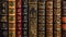 Elegant old books with decorative spines on shelf. Concept of vintage literature, decorative bookbinding, and classic