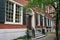 Elegant old brick townhouses with shutters