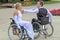 Elegant pair wheelchair dancing