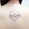 Elegant Paperclip-inspired Back Tattoo With Round Mountains