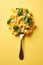 Elegant pasta on fork with fresh basil leaf in stylish minimalistic studio setting