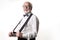 Elegant pensioner showing his new suspenders