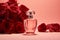 Elegant perfume bottle, pink background