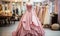 Elegant pink strapless ball gown on mannequin in a bridal boutique with various wedding dresses in the background, romantic bridal