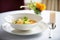 elegant plating of minestrone, fine dining restaurant setting
