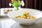 elegant plating of minestrone, fine dining restaurant setting