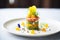 elegant plating of passion fruit and kiwi tartare