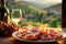 Elegant prosciutto display, with a Tuscan vineyard softly blurred in the background.