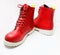 Elegant red womens shoes with laces and white soles isolated on a white background. Red men's boots