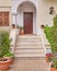 Elegant residence entrance wooden door and stairs