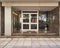 Elegant residential building entrance with metal and glass door