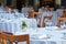 Elegant restaurant outdoor tables and chairs in summer