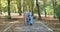 Elegant, retired family couple walking and talking in the autumn park