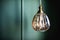 Elegant retro lamp hanging against dark green wall