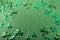 Elegant and shiny St. Patricks Day background. Green glitter and clover