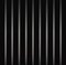 Elegant silver shiny vertical lines, stripes background glamour curtain isolated on black