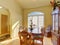 Elegant yet simple dinning room with hardwood floor.