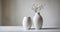 Elegant simplicity - Two white vases on a minimalist table