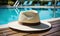 Elegant straw fedora hat resting on a poolside under the tranquil summer sun, symbolizing leisure, vacation, and the serene joy of