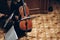 Elegant string quartet performing in luxury room at wedding reception in restaurant. woman in black playing on violin and cello