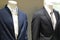 Elegant suits worn by mannequin on sale