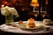 elegant table setting featuring crab cakes as appetizer