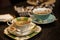 Elegant tea cup on a dark wooden table.