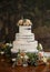 Elegant three tiered wedding cake at a wedding reception