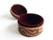 Elegant traditional Moroccan round leather box. Jewelery box with red velvet interior and open lid. Arabic handicraft on white
