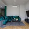 Elegant, velour emerald green sofa