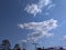 An elegant view of blue sky with some white clusters of white clouds