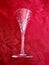 Elegant Vintage Cut Crystal Glass Stemware on Red Background