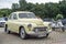 Elegant vintage old yellow Polish car Warszawa M20 parked