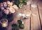 Elegant vintage wedding table decoration with roses and candles